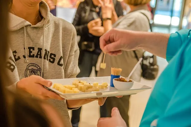Swedish meatballs and cheese tasting on a food tour in Stockholm's Östermalm food hall, Sweden